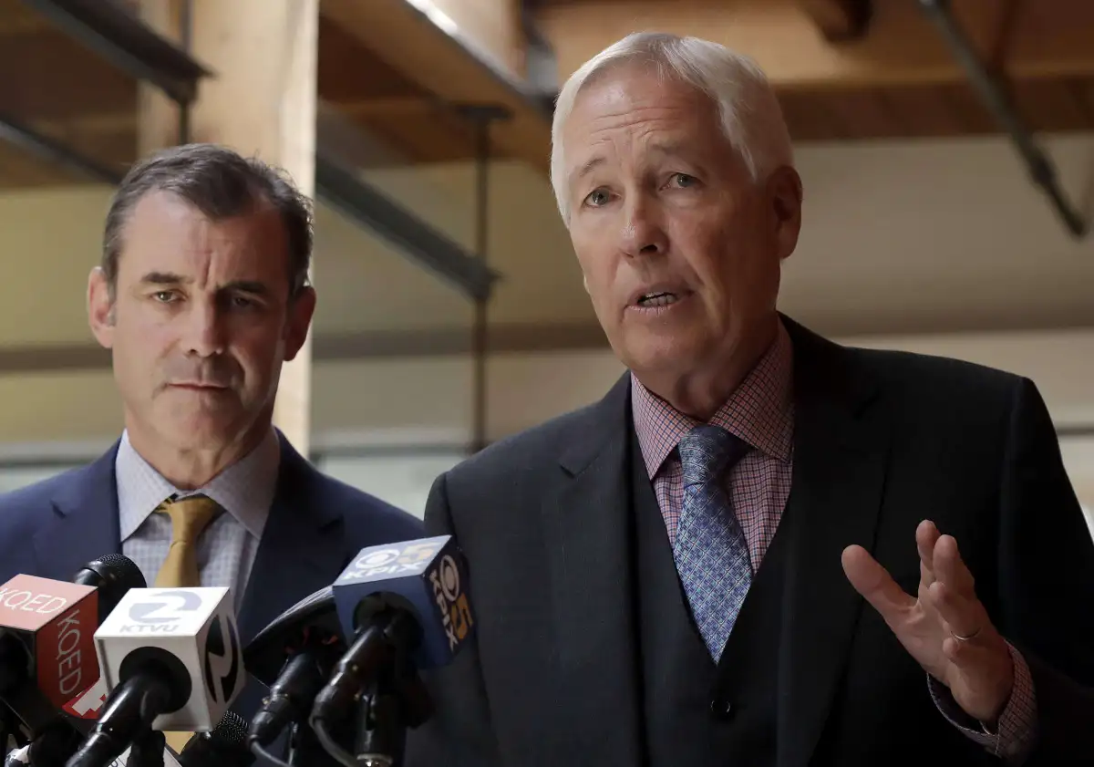 Attorneys speaking at a press conference with Bay Area media